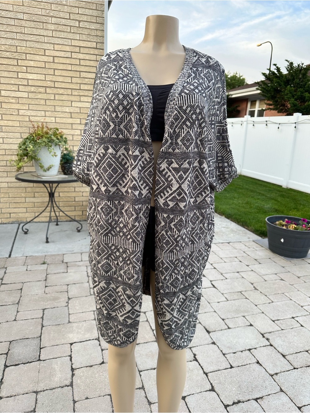 Maurice’s Black and White Geometric Open cardigan. Size M